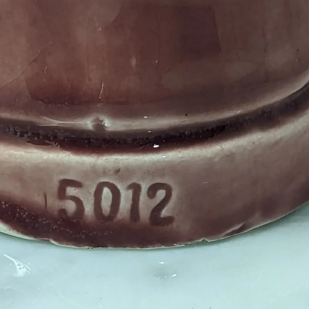 Vintage rose colored glazed pottery creamer from Czechoslovakia